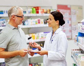 a pharmacist recommending some medicine to the customer